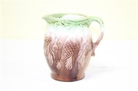 Majolica pottery pitcher with acorns and pinecones