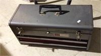 Craftsman metal toolbox filled with tools,