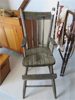 PRIMITIVE YOUTH ARM CHAIR