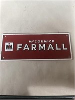 Farmall cast iron sign 10”x 4”