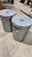 Two galvanized garbage cans
