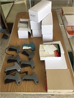 8 tag guns & 6 boxes of fastener & 4 boxes of tags