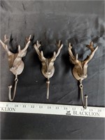 3 cast iron hooks