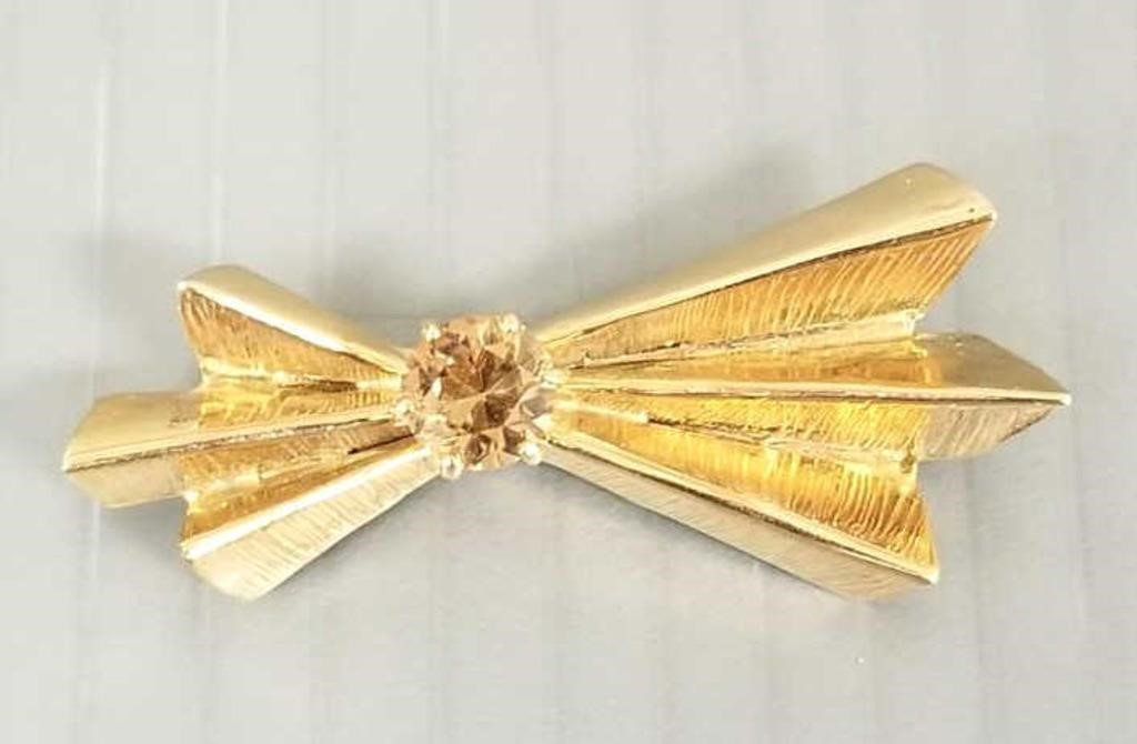 Vintage 14k gold bow brooch set with amber colored