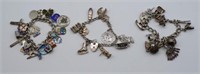 Three various silver charm bracelets