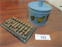 Small Abacus and Metal Container