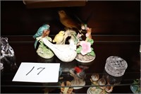 4th shelf contents of curio cabinet; Birds etc