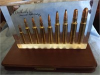 Weatherby Cartridge Display on Wood Stand
