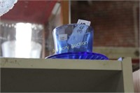 BLUE GLASS CUP W/ SAUCER ATTACHED