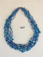 MULTISTRAND BLUE BEADED NECKLACE