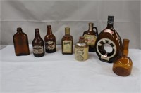Collection of amber bottles including Webb's,