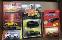 Group of an open diecast cars