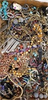 Box lot of unsorted  jewelry