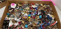 Box lot of unsorted  jewelry