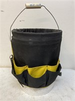 Bucket with tool holder