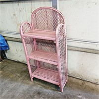 Pink wicker shelf