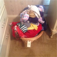 basket with misc items, (linens and sweaters)