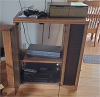 Entertainment center with VHS player and receiver