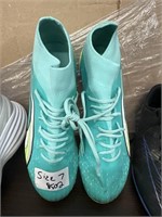 Puma sporting cleats size 7 used