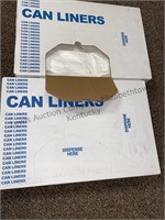 2 boxes of 36 x 58 clear can liners. 1 is open.