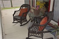 Two Wicker Rocking Chairs and Round Table