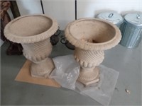 Pair of large outdoor planters.