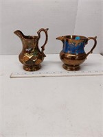 2 vintage copper luster pitchers