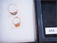 Two 10K yellow gold mountings, one missing