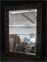 HEAVILY CARVED OAK WALL MIRROR