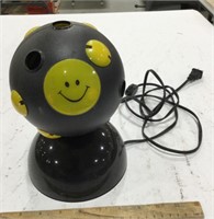 Smile face lamp 9in tall -top turns