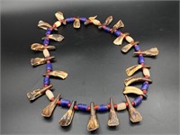 Old Buffalo tooth necklace with red white heart st