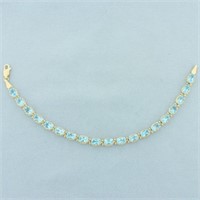 Swiss Blue Topaz Line Bracelet in 14k Yellow Gold