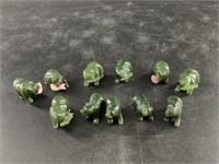 Collection of small jade bears some with fish