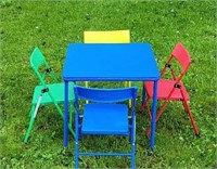 Child's card table with 4 chairs. Table legs come