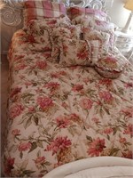 Queen-sized comforter set, sheets and pillows.