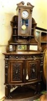 European Heavily Carved Corner Cabinet with Clock