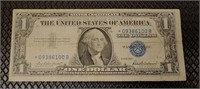 1957 $1 silver certificate star note with cut