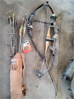 2 compound bows & 1 recurve bow & leather