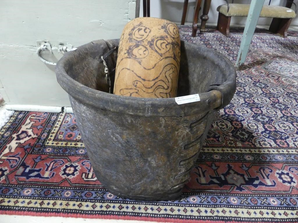 LARGE LEATHER BUCKET & CURVED WOOD CARVING