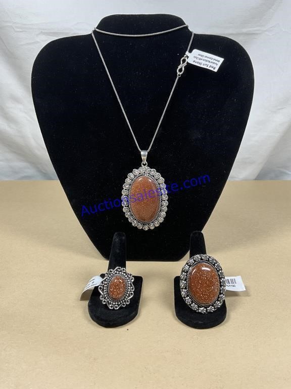 Red Sunstone pendant necklace, and two rings
