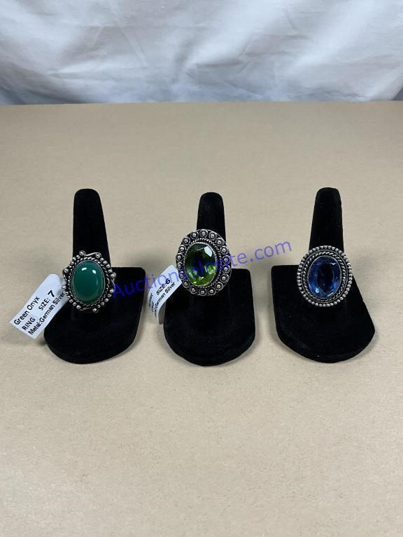 three rings, assorted stones, assorted sizes,