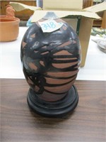 SIGNED POTTERY ON STAND