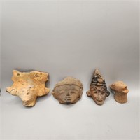 Three Pre-Columbian heads & a Jaguar head