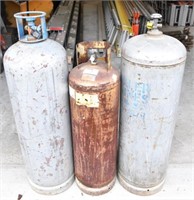 (3) Assorted size propane tanks.