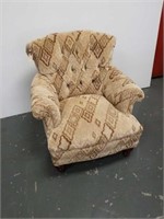 Modern armchair upholstered