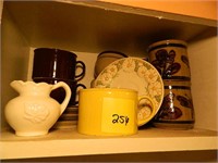 Cabinet Shelf of Pottery Items - Mugs, Plates