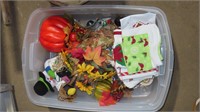 assorted fall decorations in tote