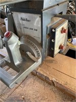 10" RADIAL ARM SAW ON TABLE WITH WHEELS