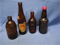 vintage beer bottles .