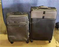 2 Guess Rolling Suitcases